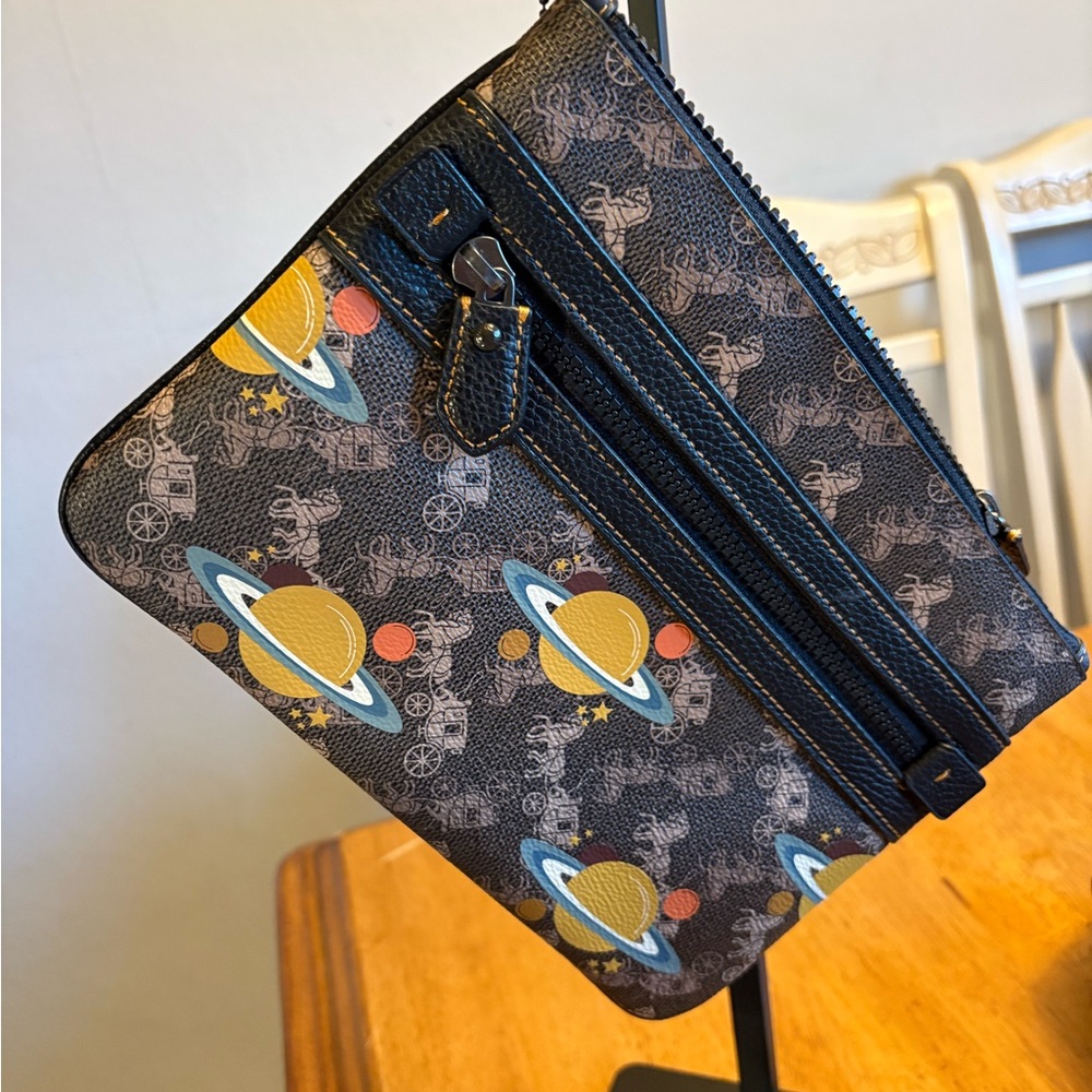 Coach planet XL wristlet